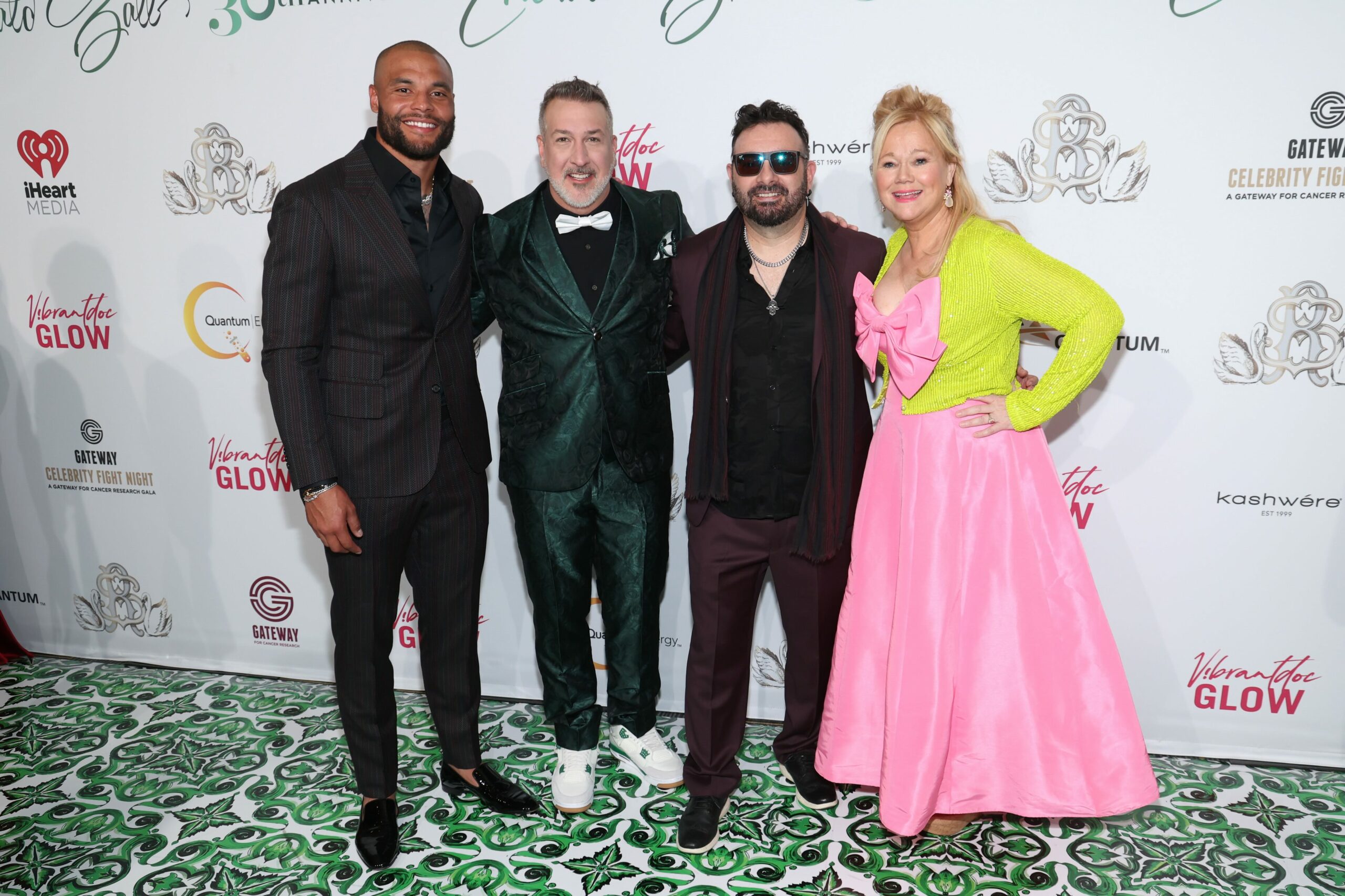 SCOTTSDALE, ARIZONA - APRIL 27: (L-R) Dak Prescott, Joey Fatone, Chris Kirkpatrick and Caroline Rhea attend Gateway Celebrity Fight Night 2024 on April 27, 2024 in Scottsdale, Arizona. (Photo by Phillip Faraone/Getty Images for Gateway For Cancer Research)